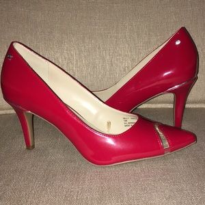 Red leather pumps